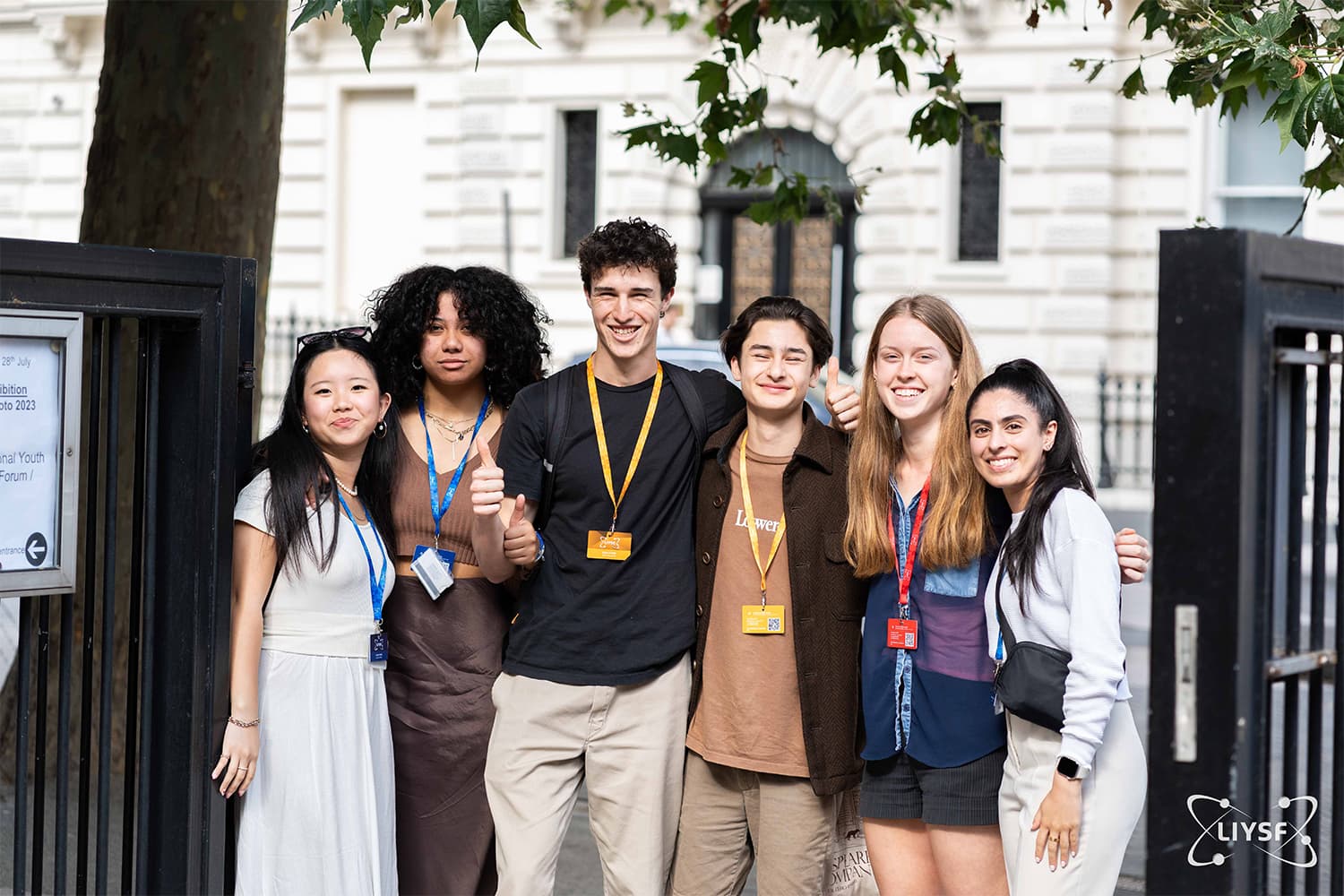 International LIYSF 2023 participants posing outside a London science institution during a scientific visit