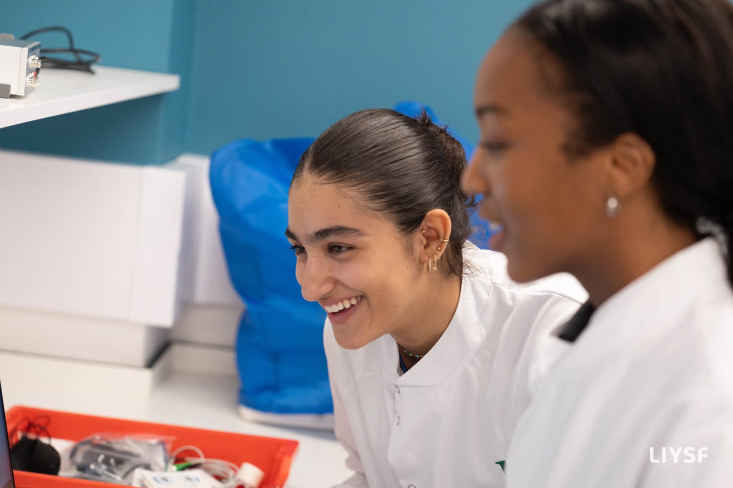 Students collaborating in a medical laboratory during a scientific visit at the 66th London International Youth Science Forum 2025