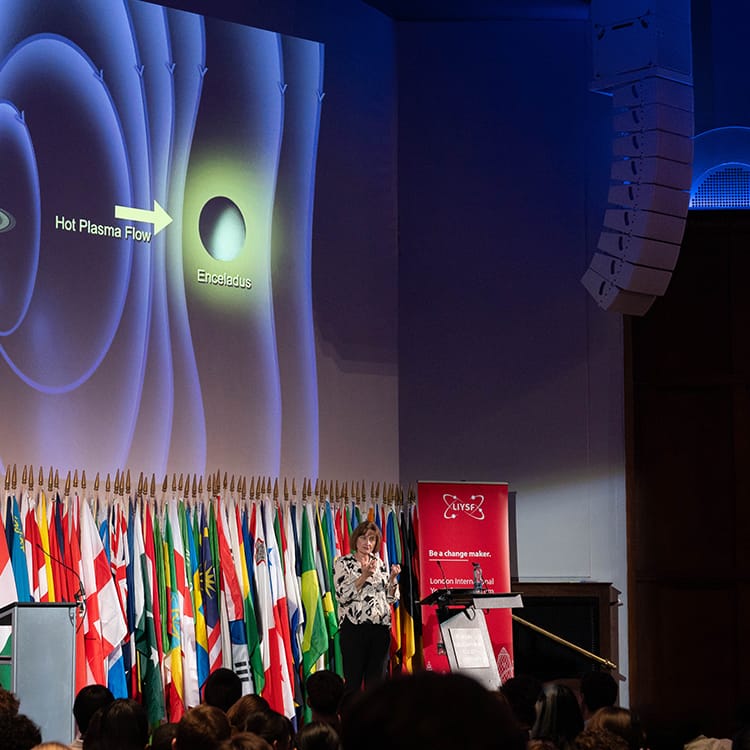 Speaker presenting a space science lecture to international students at the London International Youth Science Forum